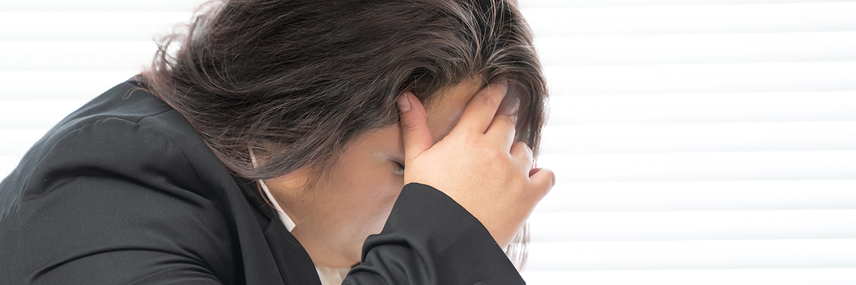 Stress anxiety Chinese woman head hand